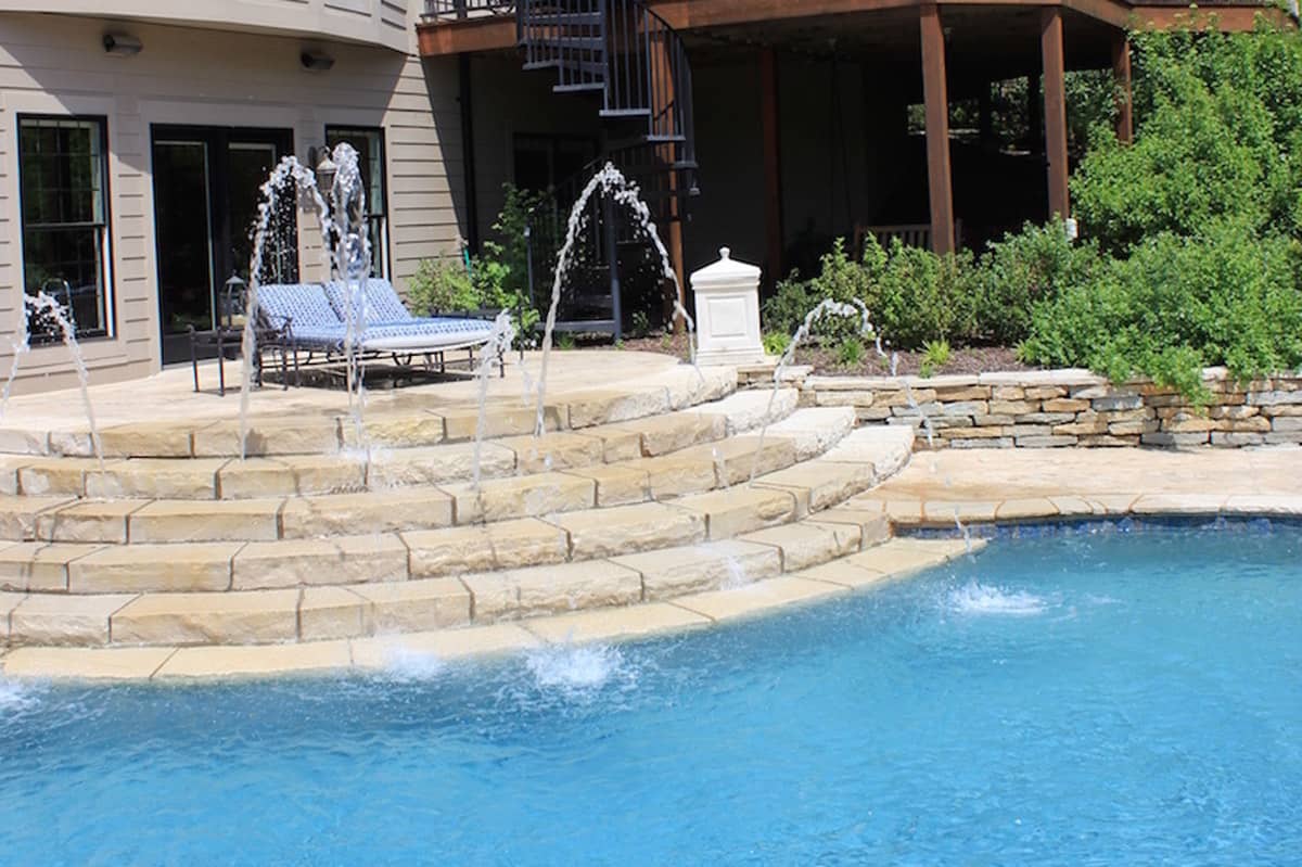 hardscape pool with fountains
