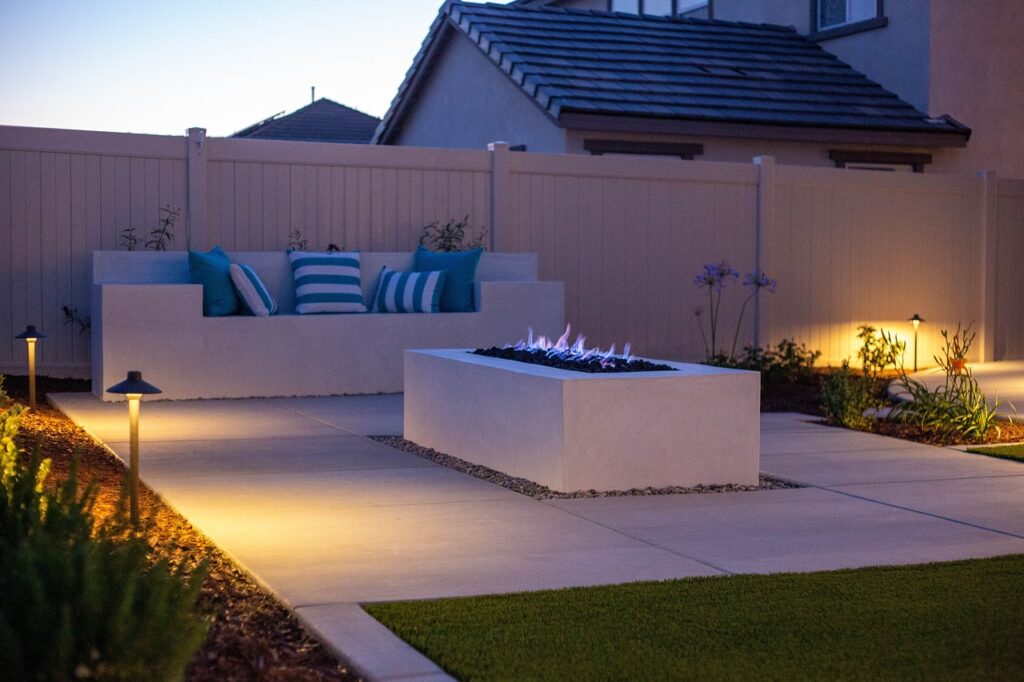 Seat and firepit with outdoor lighting in St. Louis